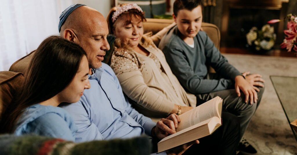 A Jewish family bonding by reading together during a holiday inside their cozy living room.